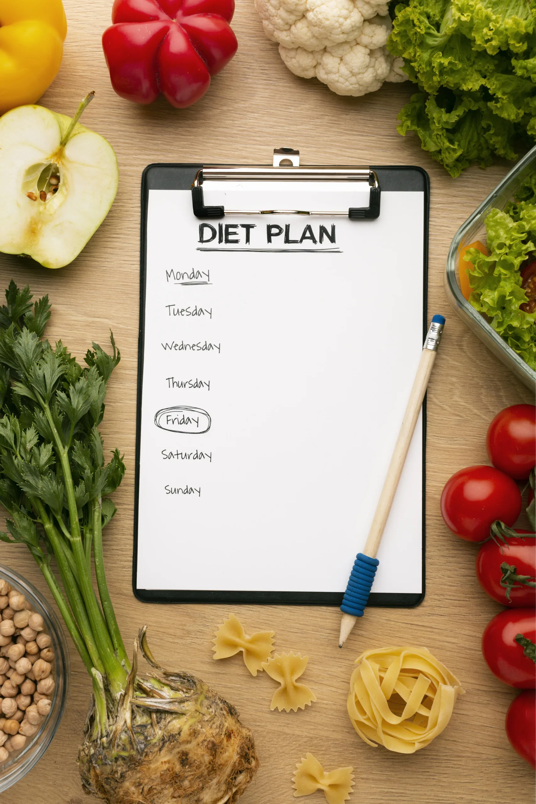 meal-planning-clipboard-food-arrangement How to get a diet plan by nouriva? First booka an apointment, choose a plan